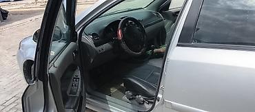 highlander platinum: Ford Focus I, 5‑дверный хэтчбек, серебристый цвет. Особенности и — 6