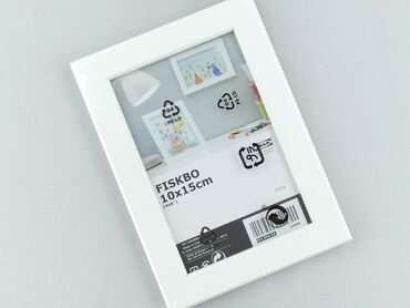 Biała ramka na zdjęcia IKEA FISKBO o wymiarach 10x15 cm, idealna do