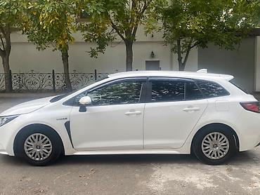 toyota bakı: Toyota Corolla Touring Sports Hybrid – ağ rəngli universal kuzov — 3