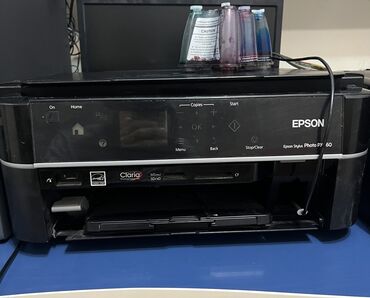 printer islenmis: Printer Epson PX660 Birinin Qalofkası dağılıb, obirisi ancag ağ Qara