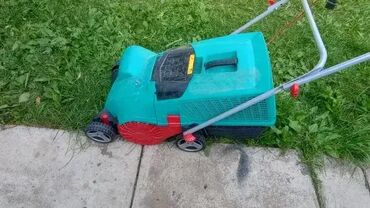 Baštenski alati i oprema: **Skidač mahovine-vertikulator Bosch UniversalVerticut 1100** ID — 1