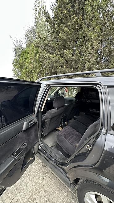 reno grand senik: Opel Astra Caravan (universal kuzov) - Geniş salon və iri baqaj: arxa — 1