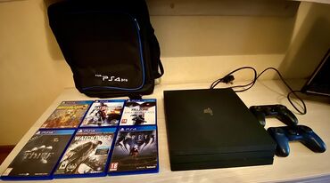 PS4 (Sony Playstation 4): Ps4 Pro, + 2 joystick, + 6 oyun, + xüsusi ps4 pro çantası. Hər şey
