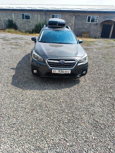 фара субару аутбек: Полноприводный универсал Subaru Outback темно-серого цвета, оснащенный