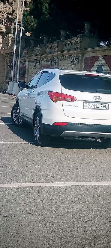 Hyundai: Hyundai Santa Fe – ağ rəngli, şəhər və uzun yol üçün rahat və geniş — 2