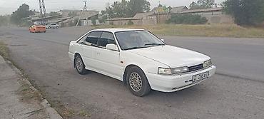 w210 430: Mazda 626: 1990 г., 2 л, Механика, Бензин, Седан — 5