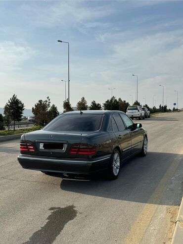 Mercedes-Benz: Mercedes-Benz E‑Class (W210) sedan Salam avtomabıl gundelık sürülür — 6