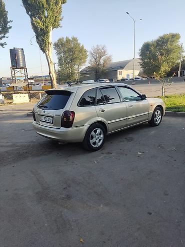 Mazda: Mazda 323: 2002 г., 1.6 л, Механика, Бензин, Универсал — 9