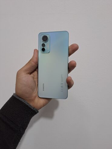 xiaomi yi lite: Xiaomi Mi 12 Lite, 256 ГБ, цвет - Синий, 
 Кнопочный, Отпечаток пальца, Две SIM карты