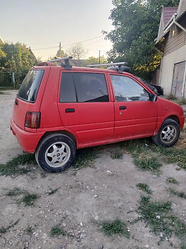 авто чегол: Daihatsu Cuore: 1993 г., 0.8 л, Механика — 1