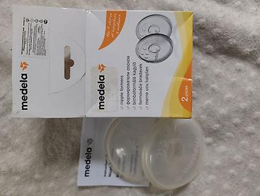 соски на выписку: Medela Nipple Formers — формирователи сосков, комплект 2 шт. - — 1