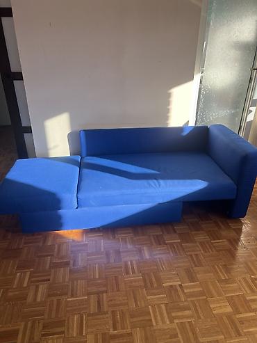 Sofe i kaučevi: Plavi trosed na razvlačenje sa ležajem - Moderan plavi trosed sa — 1