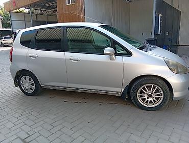 byd e6: Honda Fit: 2002 г., 1.3 л, Вариатор, Бензин, Лимузин — 1