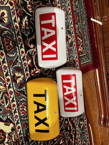 gundelik taksi ucun masinlar: Taxi işığı Taksi nişanı