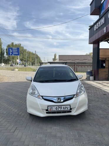 туманники на гольф 3: Honda Fit: 2012 г., 1.3 л, Вариатор, Гибрид, Хэтчбэк