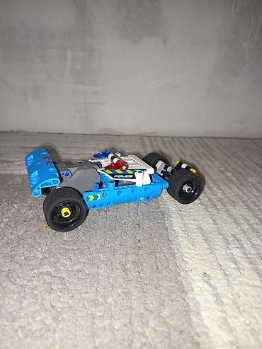 кукла купить: Конструктор LEGO Technic — полицейский гоночный автомобиль - Модель — 3