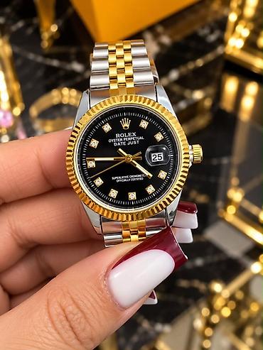 casio sumqayit: Məhsul: Qol saatları – klassik və elegan dizaynlar Təsvir: - Rolex — 2