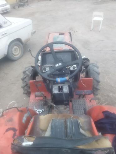 Другие мини-тракторы: Компактный колесный тракт (мини-трактор) красного цвета. Основные — 5