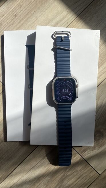 Apple Watch: Apple Watch Ultra 2 (49 мм) с титановым корпусом и синим ремешком