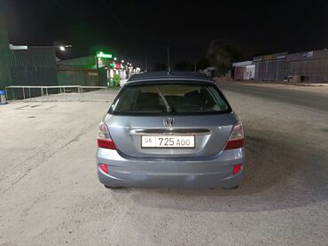 авто для такси: Хэтчбек Honda Civic серого цвета, оформленный для работы в такси