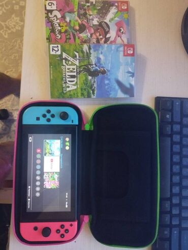 PS2 & PS1 (Sony PlayStation 2 & 1): Nintendo switch v2 model. Elave 64GB yaddash karti, icinde akkauntla