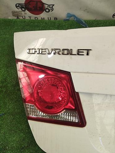 ktopi led: Фонарь крышки багажника Chevrolet Cruze J300 2011 лев. (б/у) — 1