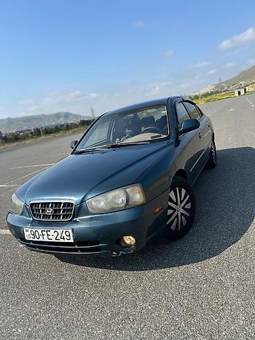 karopkalar: Hyundai Elantra: 2 l | 2003 il Sedan — 1
