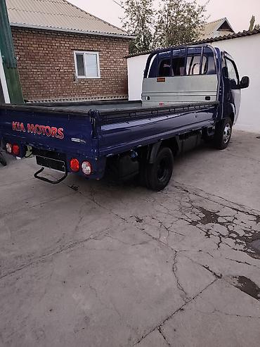 борта: KIA Bongo (K2500/K2700) бортовой малотоннажный грузовик, синий цвет — 8