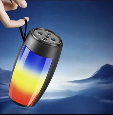 розовые наушники: Портативная Bluetooth‑колонка с LED‑подсветкой - Компактный