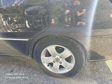 kia r17: Kia Carens, qara rəng, 5 qapılı MPV/miniven. - dizel mühərriki, ön — 9