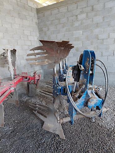 Оборотные плуги, перевертыши: Продаю два плуг на МтЗ ЮтО турецкий .UNLU 4+ перьевые отвалы цена — 9