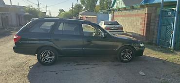 япония машина: Mazda Capella: 2000 г., 2 л, Механика, Бензин, Универсал — 4