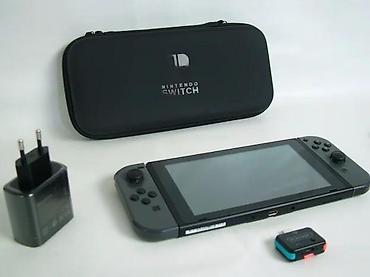 Nintendo Switch: Uz konzolu dolazi: Tablet (konzola) Joy-Con džojstici Punjač — 2