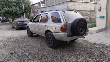 tecili satilan avtomobiller: Honda Passport: 3.2 л | 1999 г