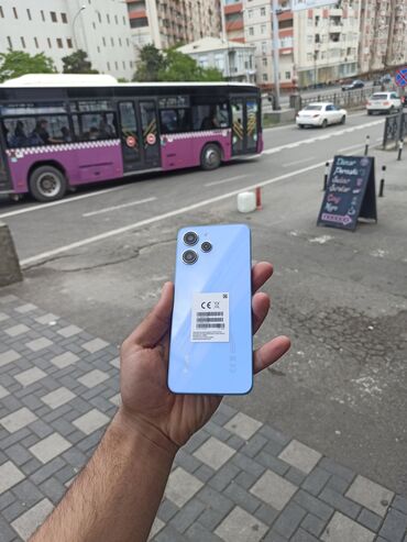 телефон флай нимбус 9: Xiaomi Redmi 12, 256 ГБ, цвет - Синий, 
 Кнопочный, Отпечаток пальца, Две SIM карты