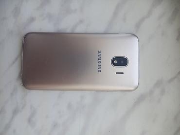 samsung j: Samsung 16 GB, rəng - Qızılı, İki sim kartlı — 2