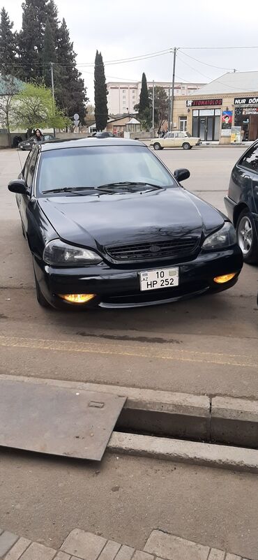 berber teleb olunur: Kia Clarus: 2 l | 1999 il Sedan