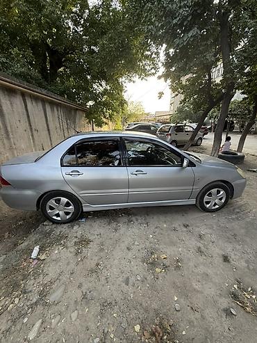 highlander platinum: Mitsubishi Lancer: 2003 г., 1.6 л, Механика, Бензин, Седан — 8
