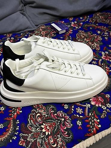 гермес обувь: Кеды GUESS в бело-чёрном исполнении. Лаконичная низкая модель с — 3