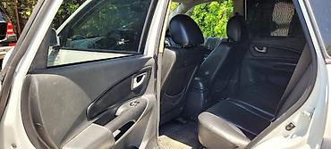 qabaq şüşə: Hyundai Tucson: 4.4 l | 2009 il Krossover — 4