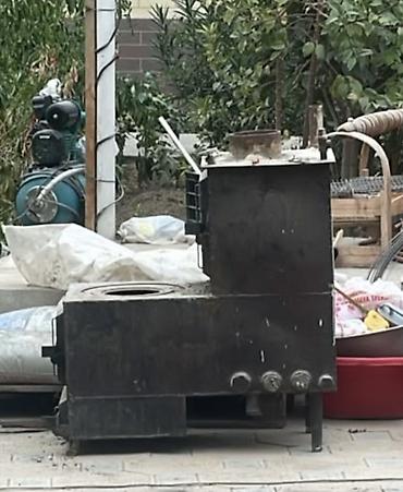 Металлическая твердотопливная печь-буржуйка c варочной поверхностью