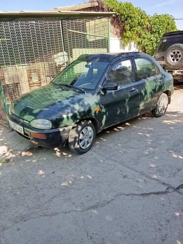 додж неон 2: Автомобиль Mazda121 в кузове седан. Оснащен люком на крыше, что