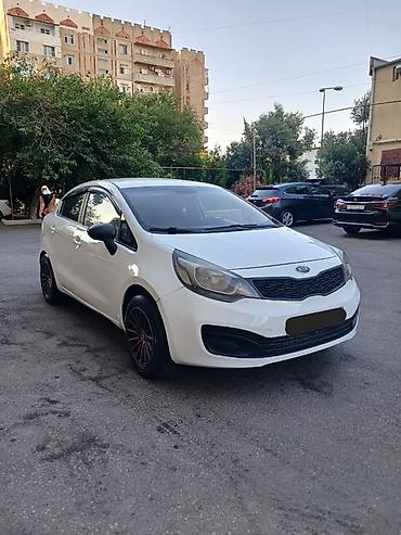 kredit vaz 2106: Kia Rio: 1.4 l | 2012 il Sedan — 7