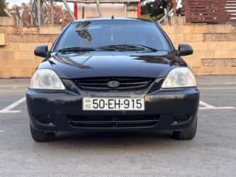 Kia: Kia Rio RS, qara rəng, hetçbek gövdə. Əsas xüsusiyyətlər: - 5 qapılı — 8