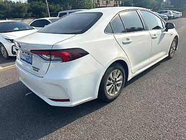 sonata 2004: Toyota Corolla: 2023 г., Гибрид, Седан — 5