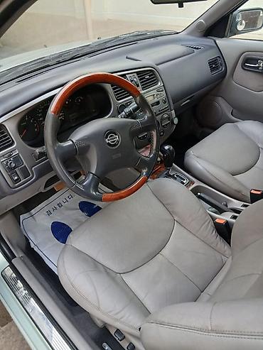 амыватель: Nissan Primera: 2001 г., 2 л, Автомат, Бензин, Универсал — 3