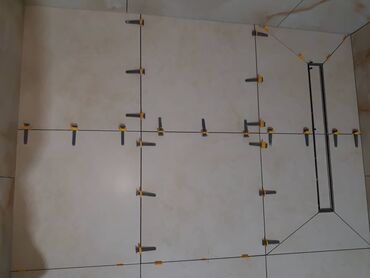 Укладка плитки: Подготовка стен для грунтовки, Резка плитки, Гидроизоляционные работы | Керамическая плитка, Керамогранитая плитка, Мозаичная плитка | Горизонтальная укладка, Раскладка в разбежку, Раскладка ковром Больше 6 лет опыта — 5