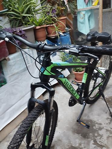 velo mtb: Veloriz 29 dağ velosipedi. Qara-yaşıl rəng kombinliyə malikdir və MTB — 4
