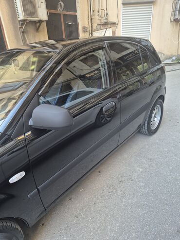 Kia: Kia Rio: 1.4 l | 2009 il Sedan — 17