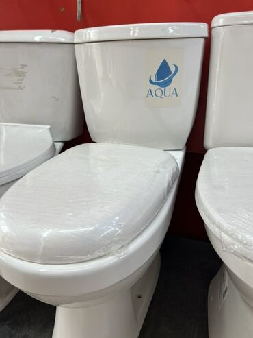 купить кухонный шкафчик напольный: Белый унитаз Aqua с бачком. Компактная модель подойдет для небольших